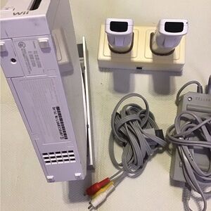 White Wii Console with Accessories 
 Need chargers control